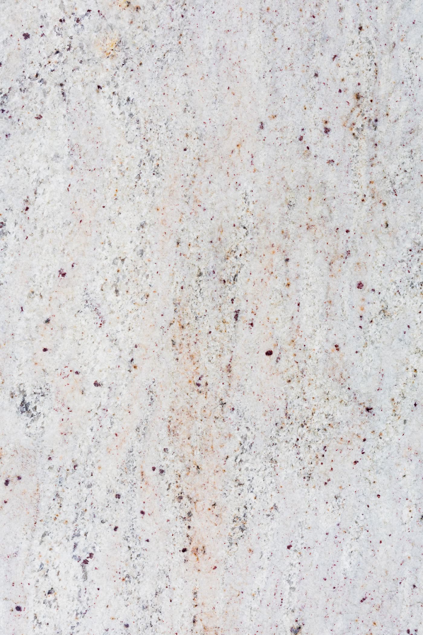 Close-up of natural white and gray speckled granite stone texture
